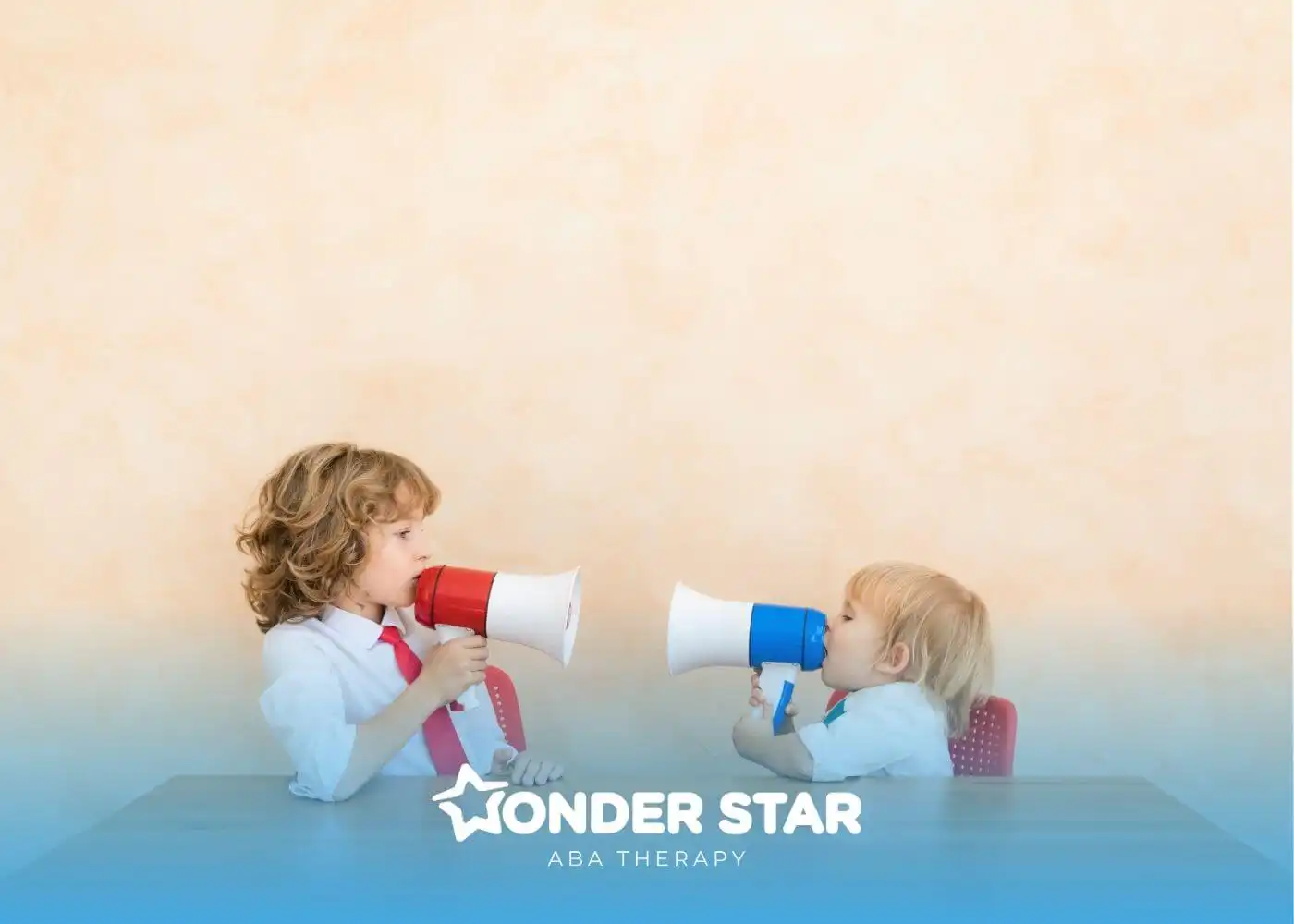Two autistic children sitting at a table using toy megaphones to communicate, illustrating playful speech and interaction.