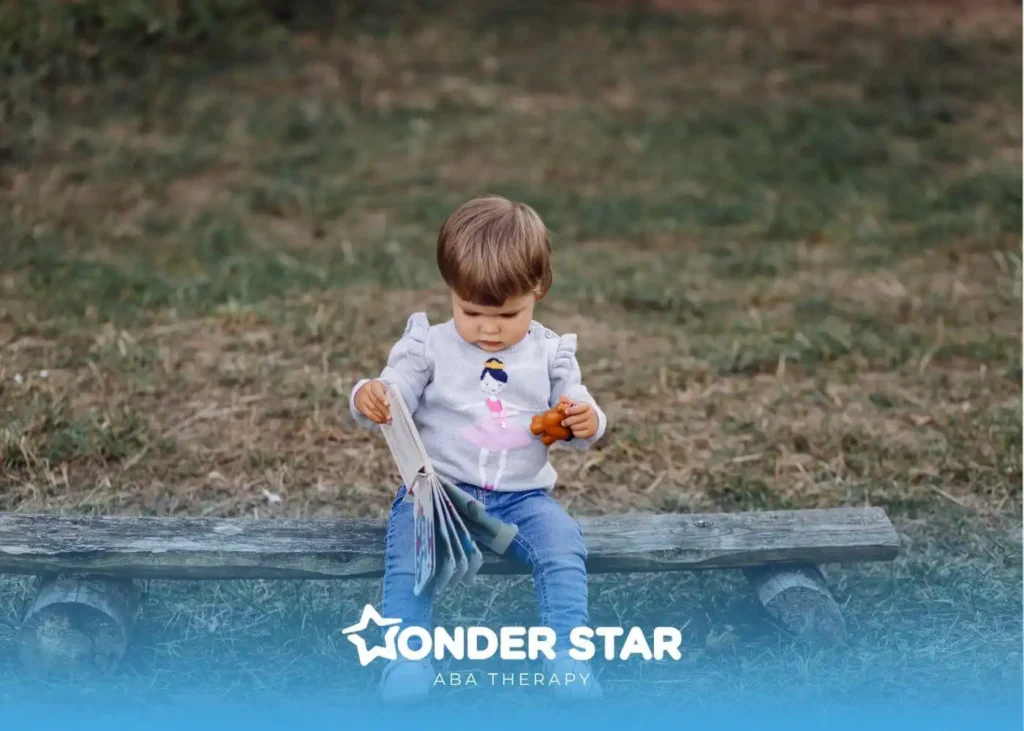 Autistic toddler plays independently on bench, symbolizing early childhood development and autism screening signs.